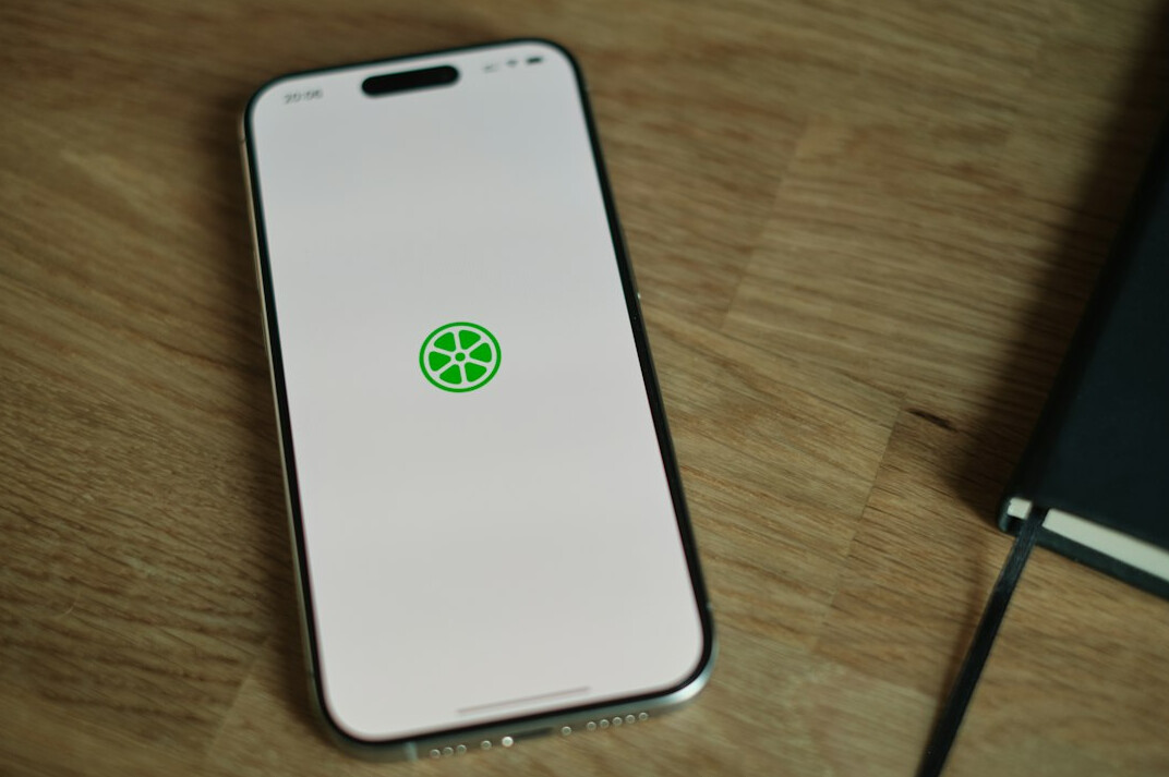 Phone with a green shield icon on screen